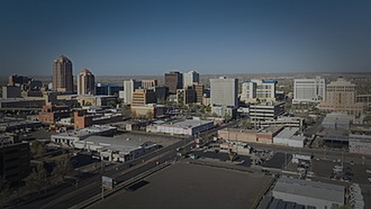 Albuquerque skyline themed Pine Script service cover with dark market grading