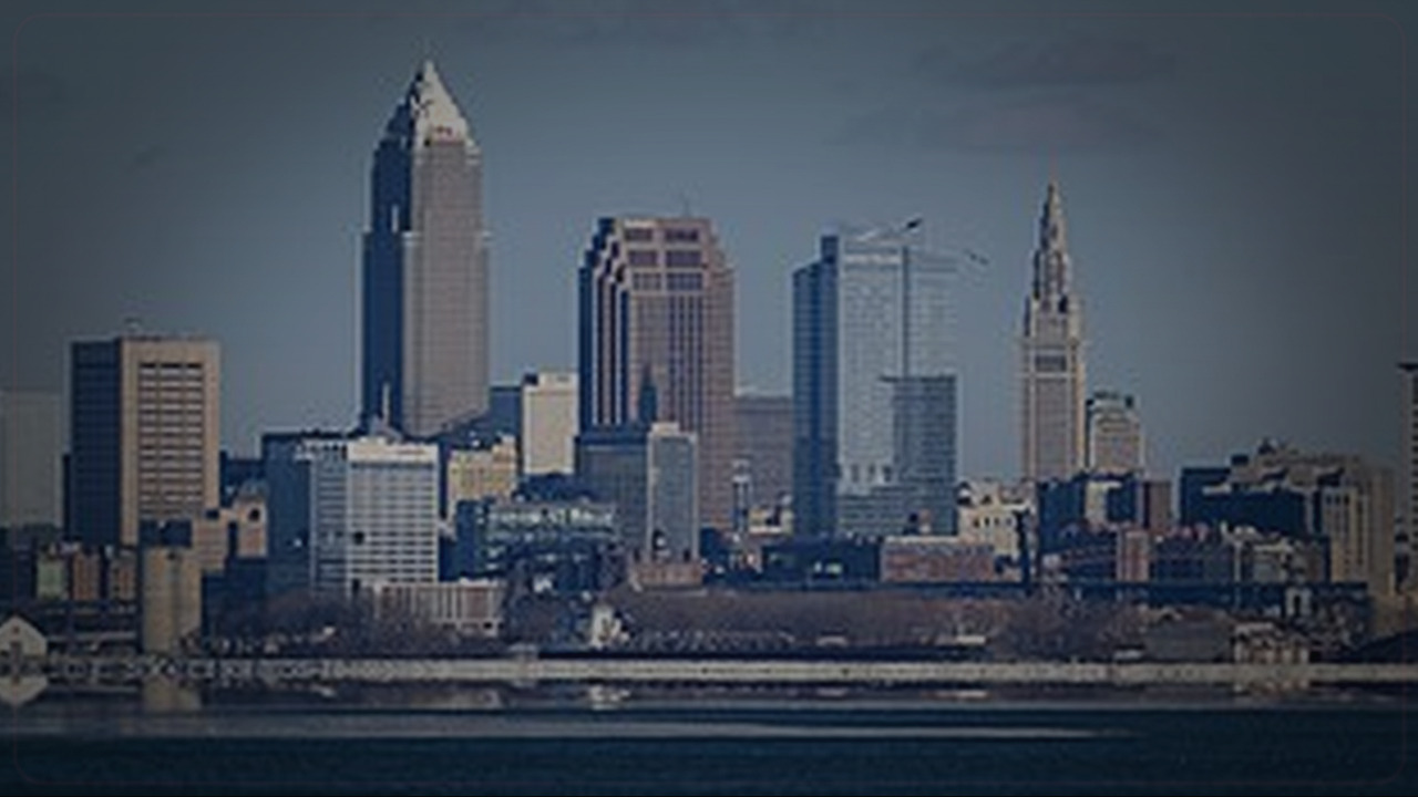 Cleveland skyline themed Pine Script service cover with dark market grading