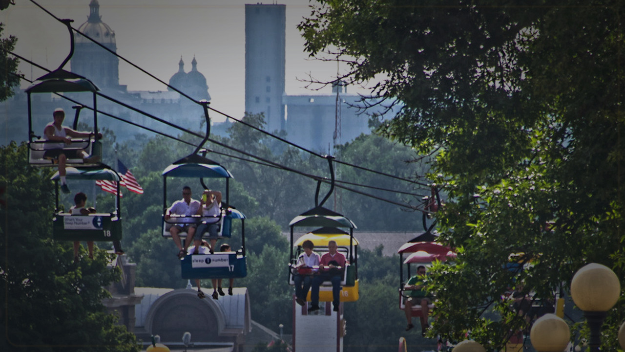 Des Moines skyline themed Pine Script service cover with dark market grading