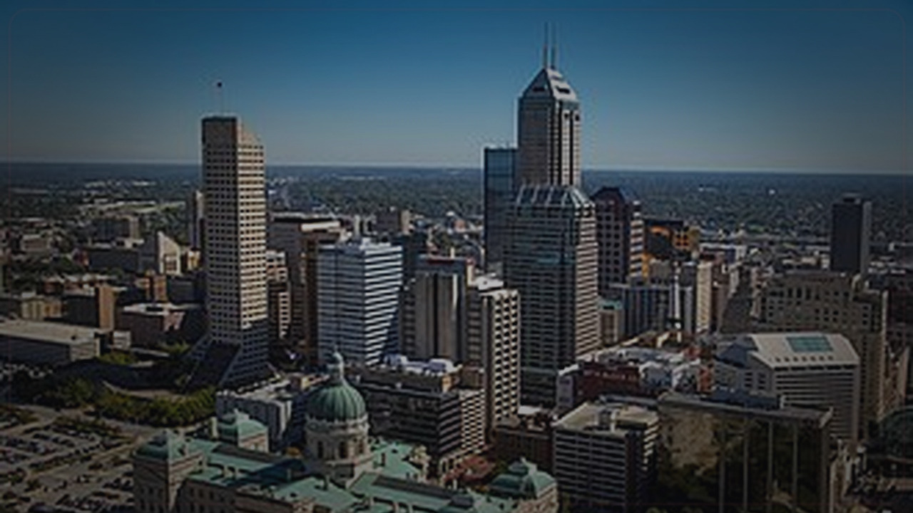 Indianapolis skyline themed Pine Script service cover with dark market grading