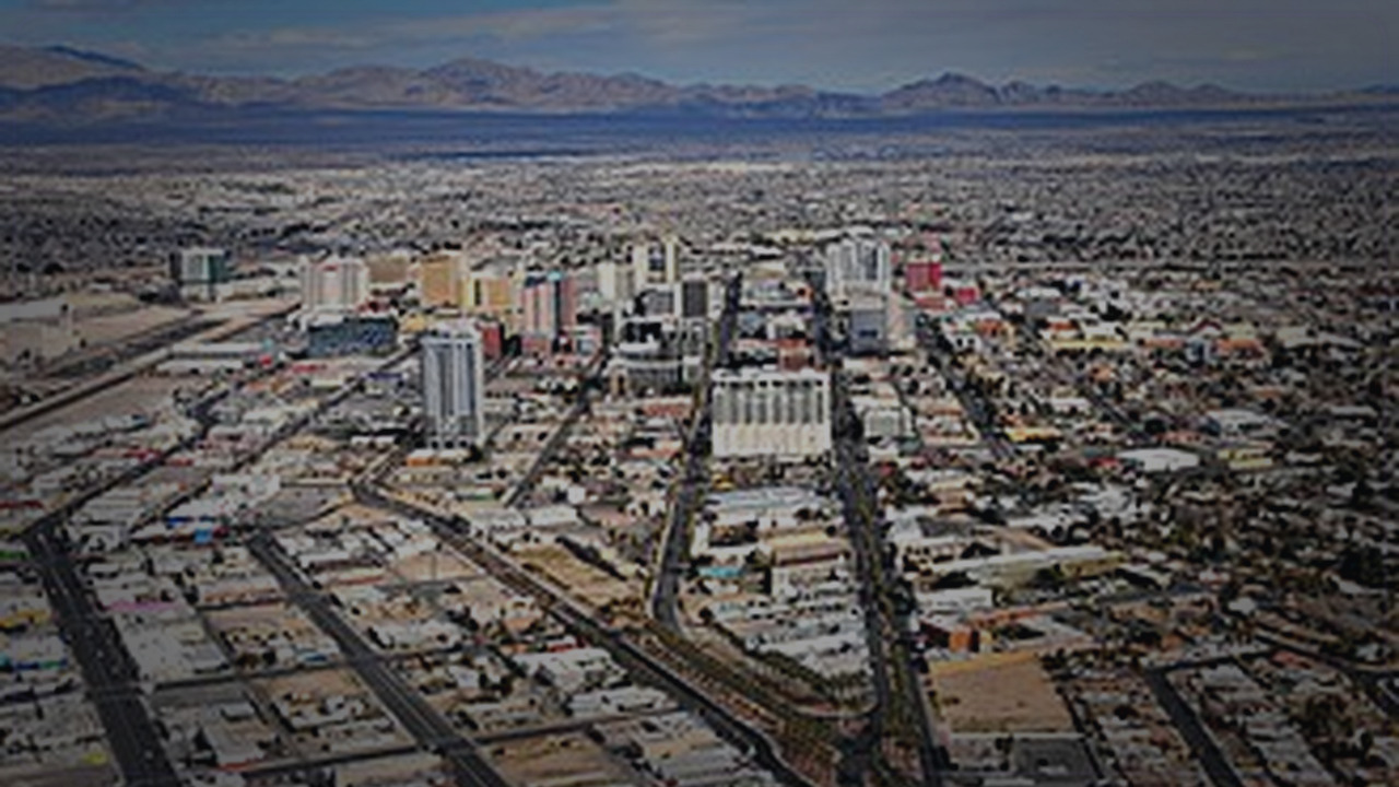 Las Vegas skyline themed Pine Script service cover with dark market grading