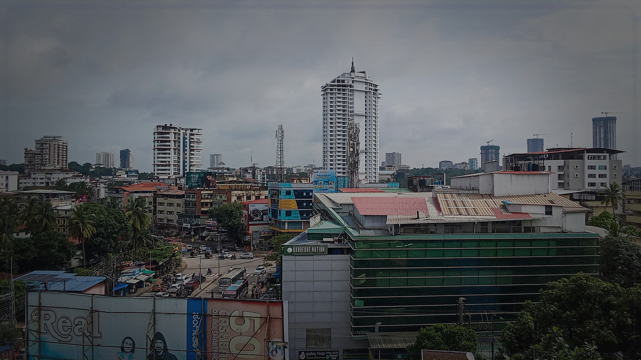 Mangalore India skyline themed Pine Script service cover with dark market grading