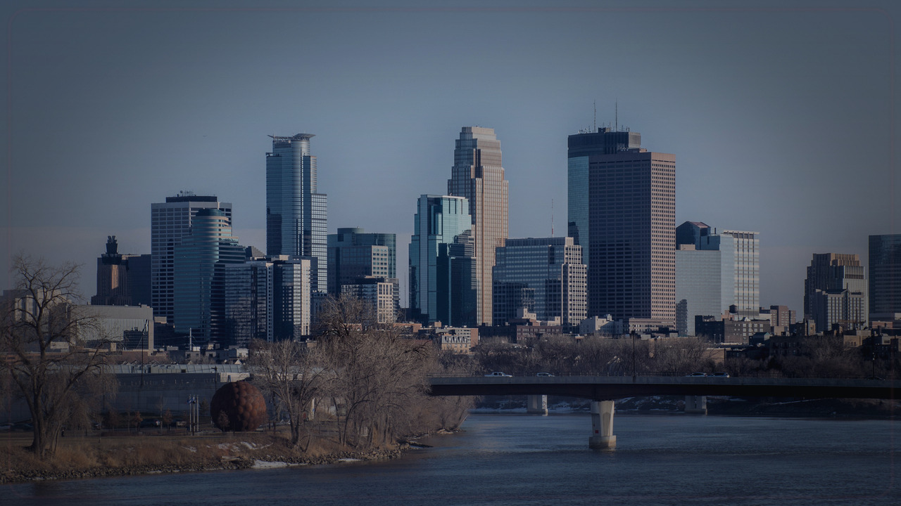Minneapolis skyline themed Pine Script service cover with dark market grading