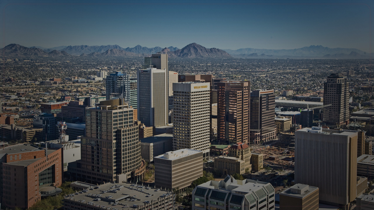 Phoenix skyline themed Pine Script service cover with dark market grading