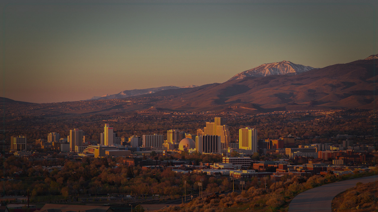 Reno skyline themed Pine Script service cover with dark market grading