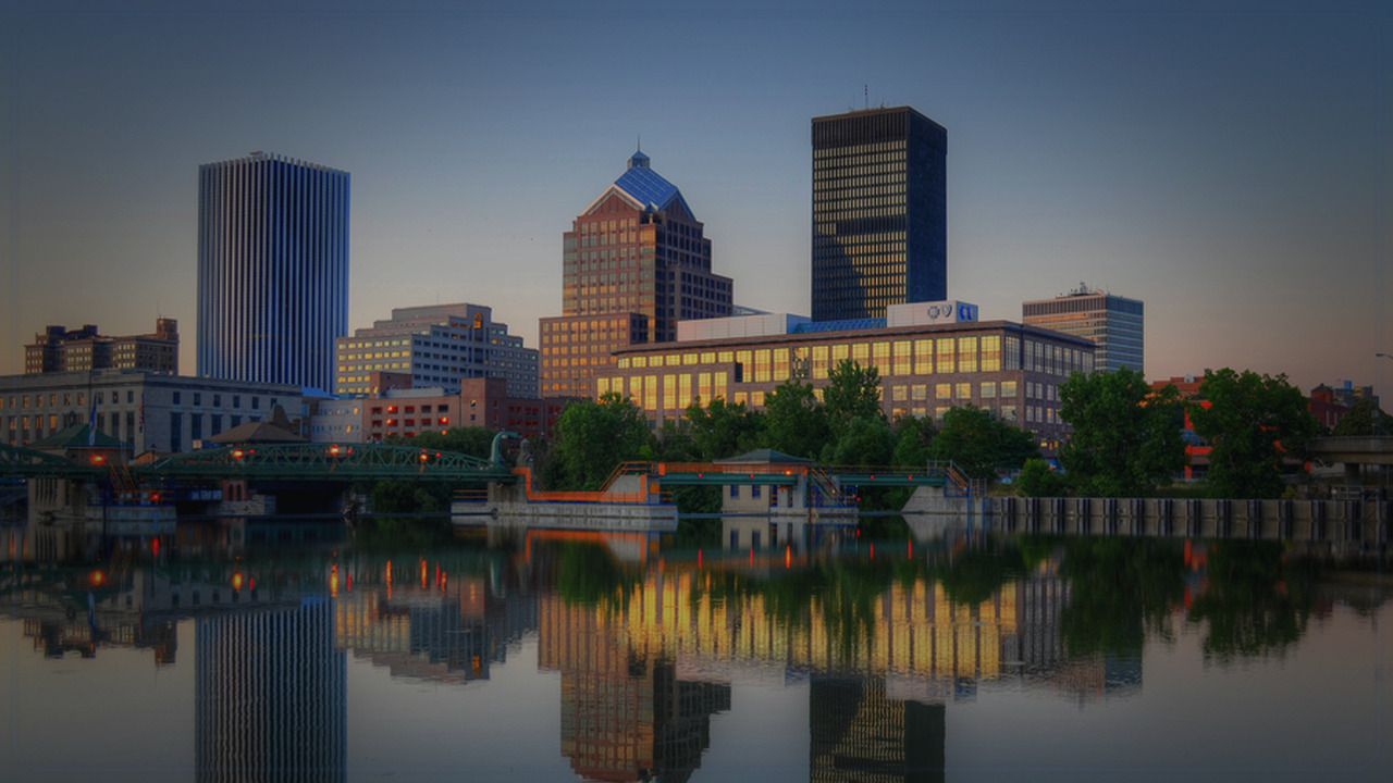 Rochester skyline themed Pine Script service cover with dark market grading