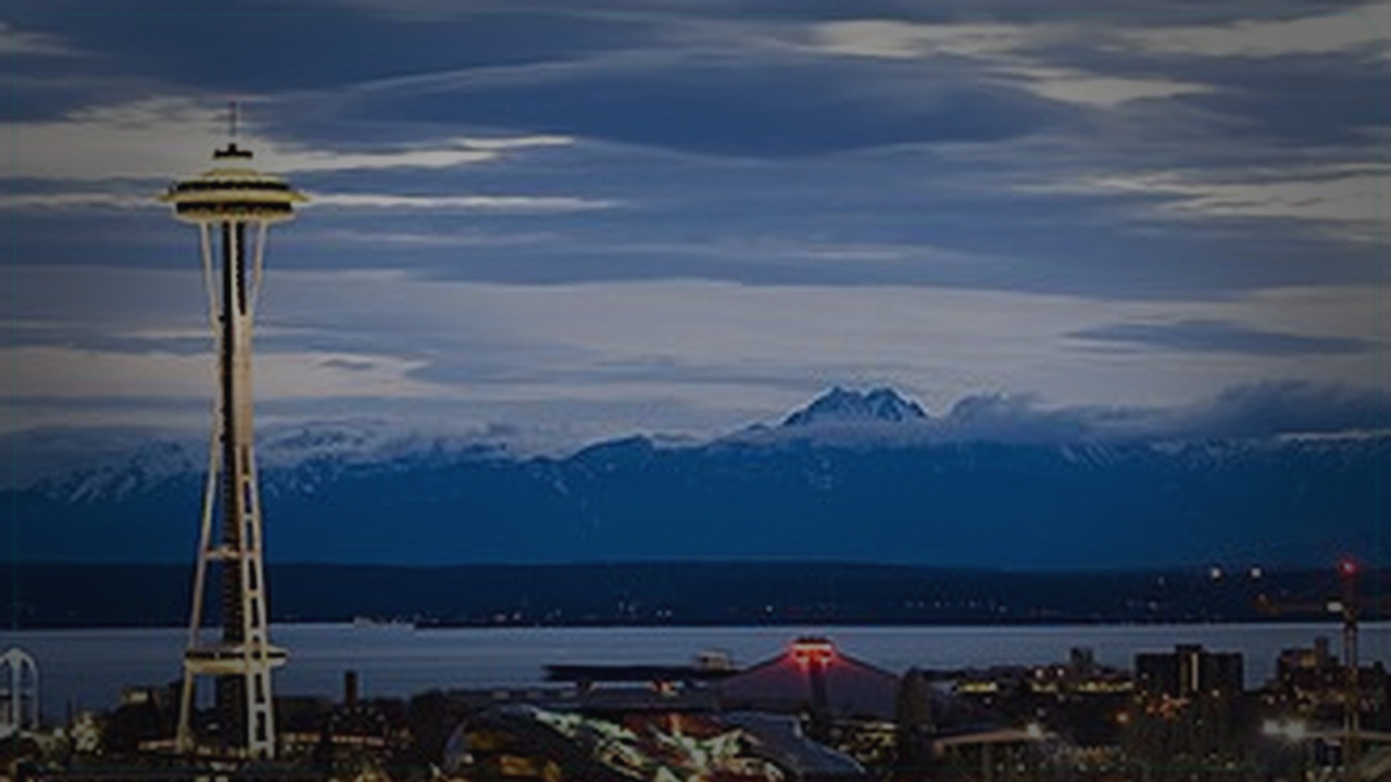 Seattle skyline themed Pine Script service cover with dark market grading