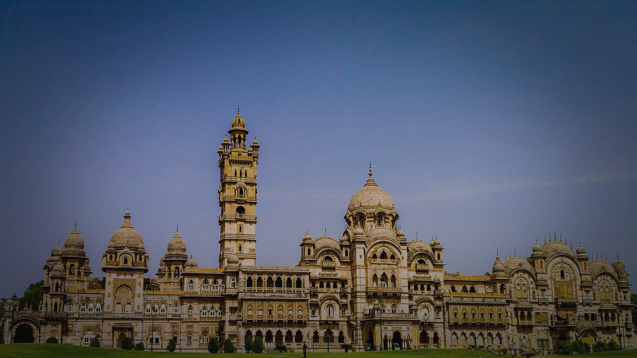 Vadodara India skyline themed Pine Script service cover with dark market grading