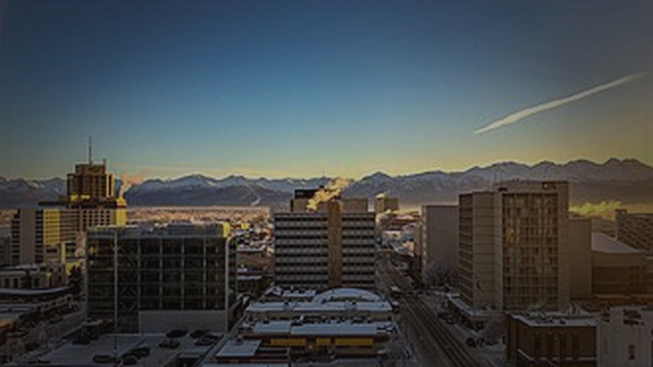 Anchorage skyline themed Pine Script service cover with dark market grading