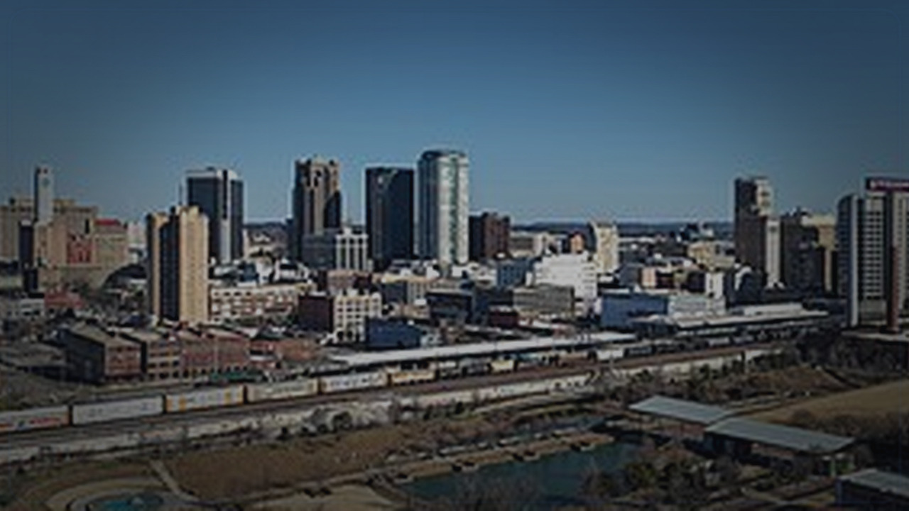 Birmingham skyline themed Pine Script service cover with dark market grading