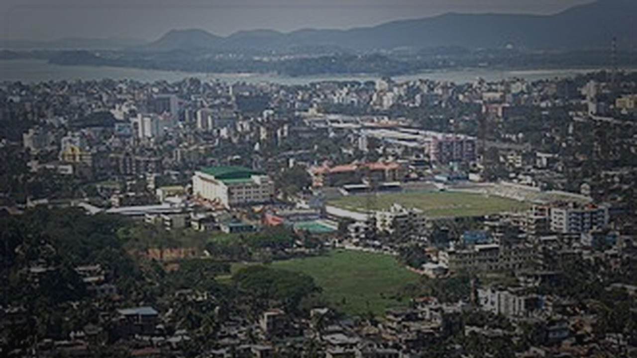 Guwahati India skyline themed Pine Script service cover with dark market grading
