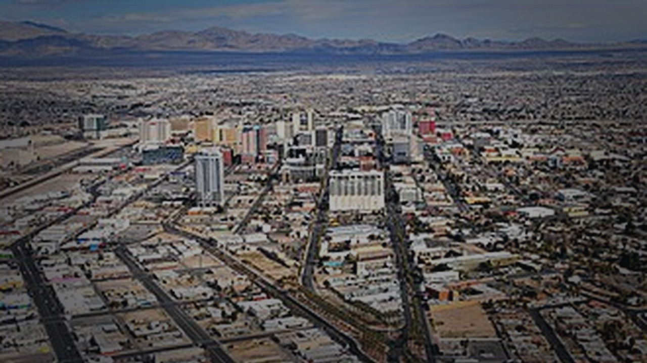 Las Vegas skyline themed Pine Script service cover with dark market grading