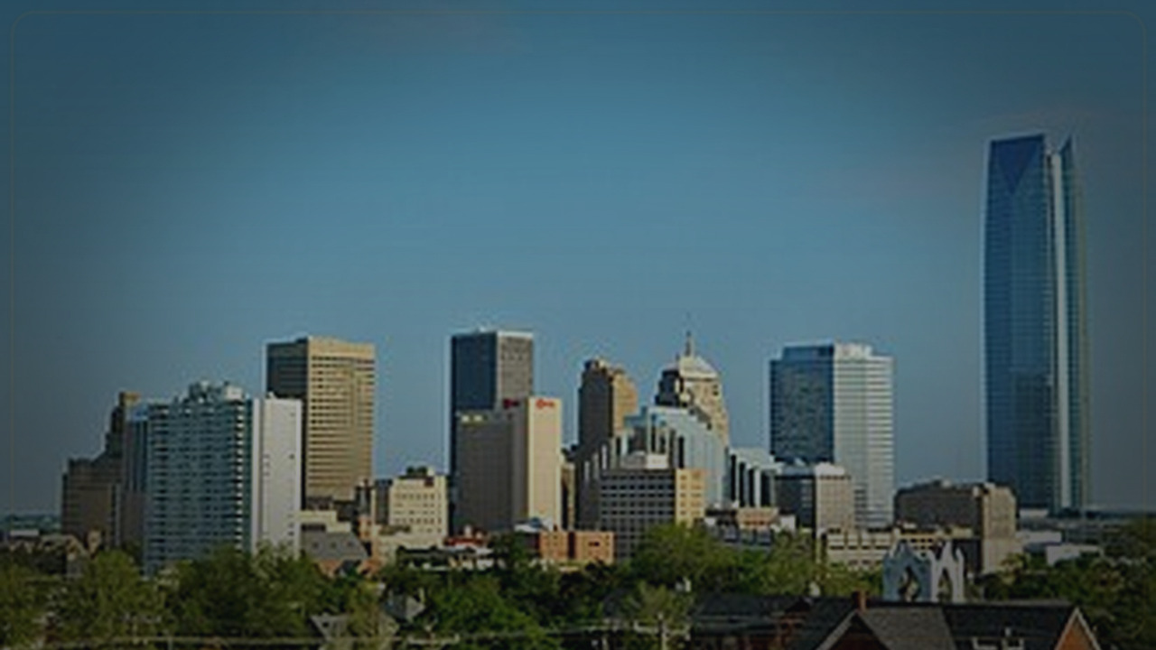 Oklahoma City skyline themed Pine Script service cover with dark market grading