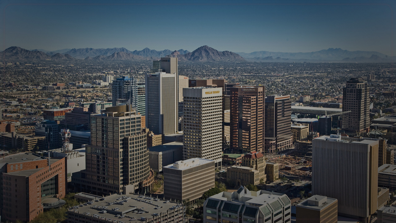 Phoenix skyline themed Pine Script service cover with dark market grading