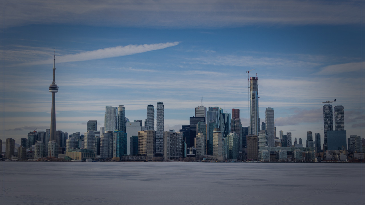 Toronto themed Pine Script and TSX service cover with dark trading visuals